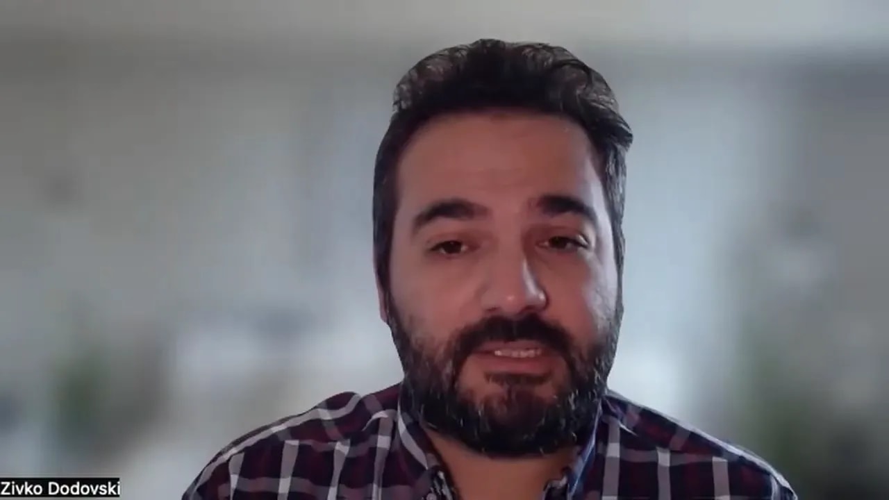 Centered presenter on a video call making the case that discounts alone don’t solve implementation or risk concerns