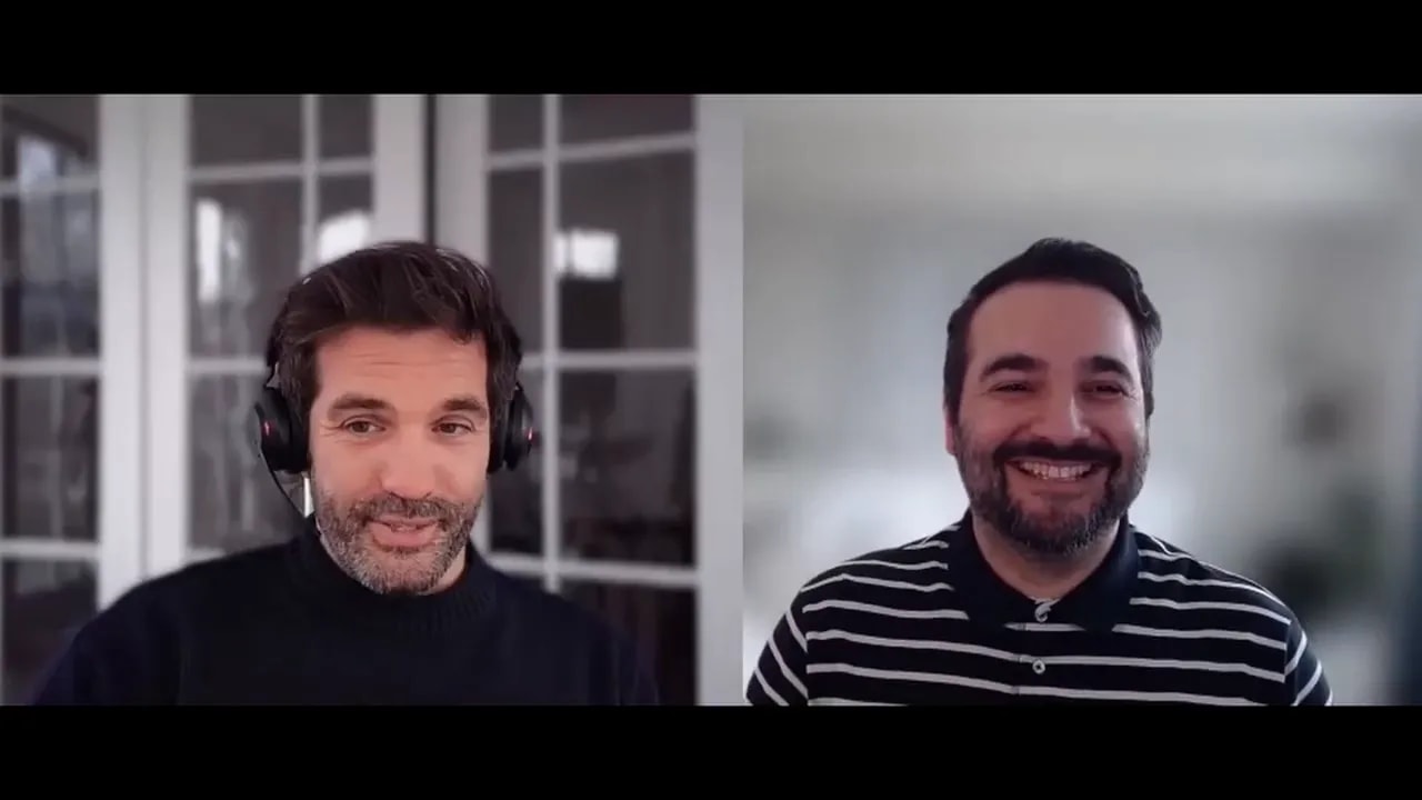 Two speakers in a video interview using a metaphor to explain the founder-to-CEO shift