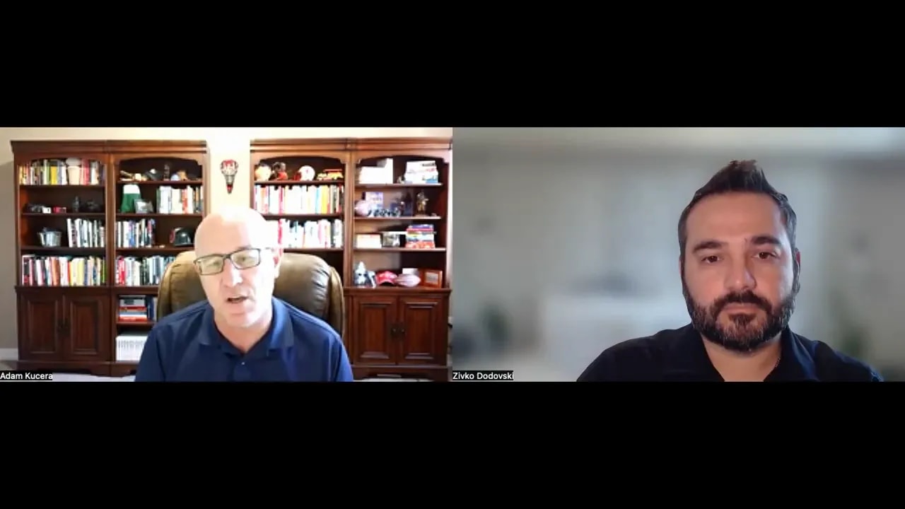 Clear Zoom screenshot of two speakers in a discussion about validating operational systems before hiring.